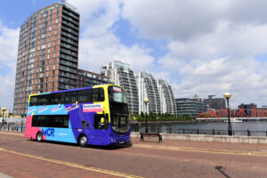 Manchester We've Missed You bus on Salford Quays