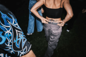 A 'tram stamp' on the back of a festival goer