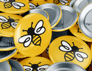 Bee badges for Go North West's Bee Ready campaign
