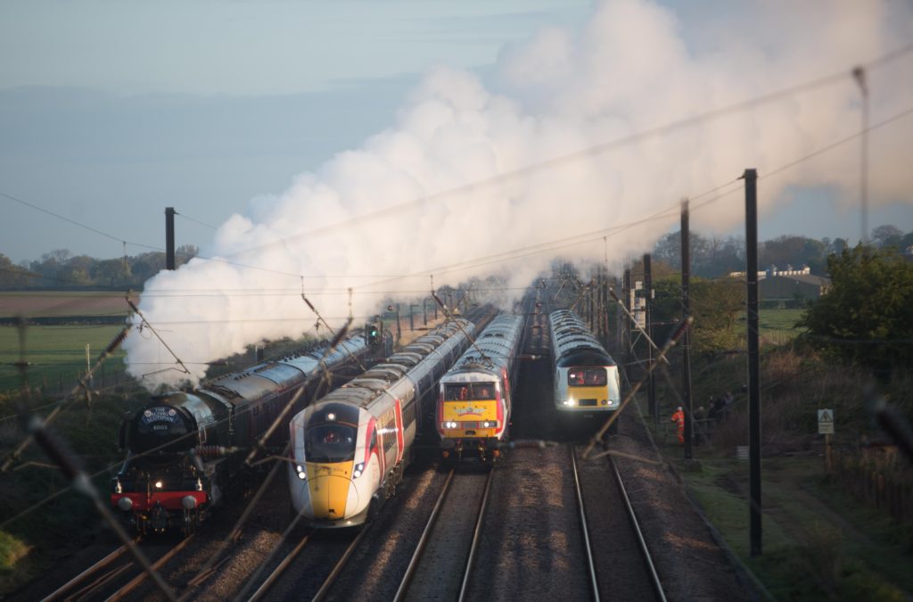The Flying Scotsman and Virgin Trains new Azuma travel in the same direction alongside two of VTECs revitalised present day fleet to depict the past, present and future of UK rail travel, in a world first event, in the North Yorkshire countryside.