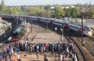 EDITORIAL USE ONLY L-R The Flying Scotsman and Virgin Trains new Azuma arrive at York Station to join two of the rail operators revitalised present day fleet  to depict the past, present and future of UK rail travel, in a world first event. PRESS ASSOCIATION Photo. Picture date: Sunday April 23, 2017. The historic journey is celebrating the iconic locomotives as the rail operator looks forward to 2018 when the Azuma, which is set to be one of the most advanced trains on the UKs rail network, will usher in a new era for travel on the East Coast route.