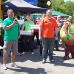 Trent Barton Managing Director Jeff Counsell (left), Commercial Director Alex Hornby and Mr MANGO give a speech before cutting the cake. Image copyright: transportdesigned.